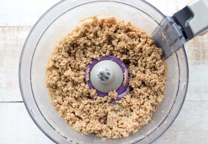 Mixed dough for Keto cinnamon cereal in a food processor