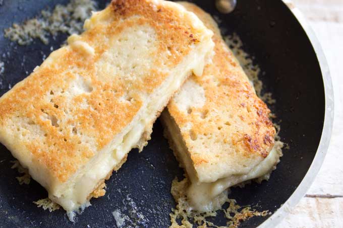 cheese toasties in a frying pan