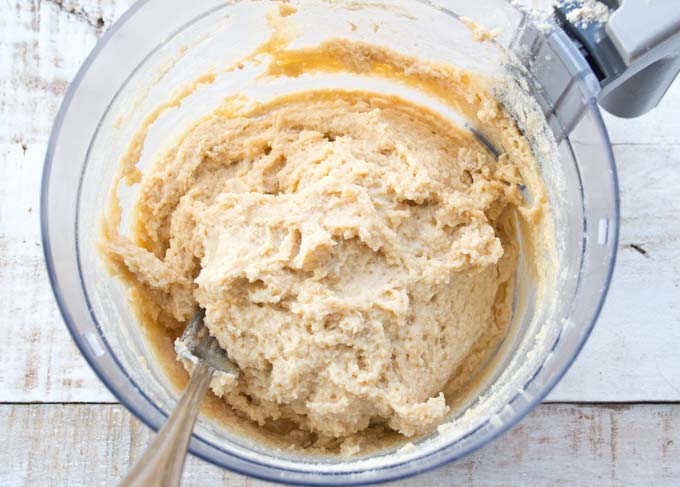 mixed dough for keto bread rolls in a bowl and a fork