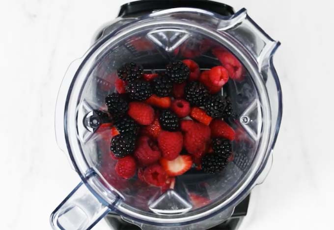 strawberries, raspberries and blackberries in a food processor