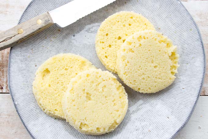 sliced low carb shortbread on a plate and a knife