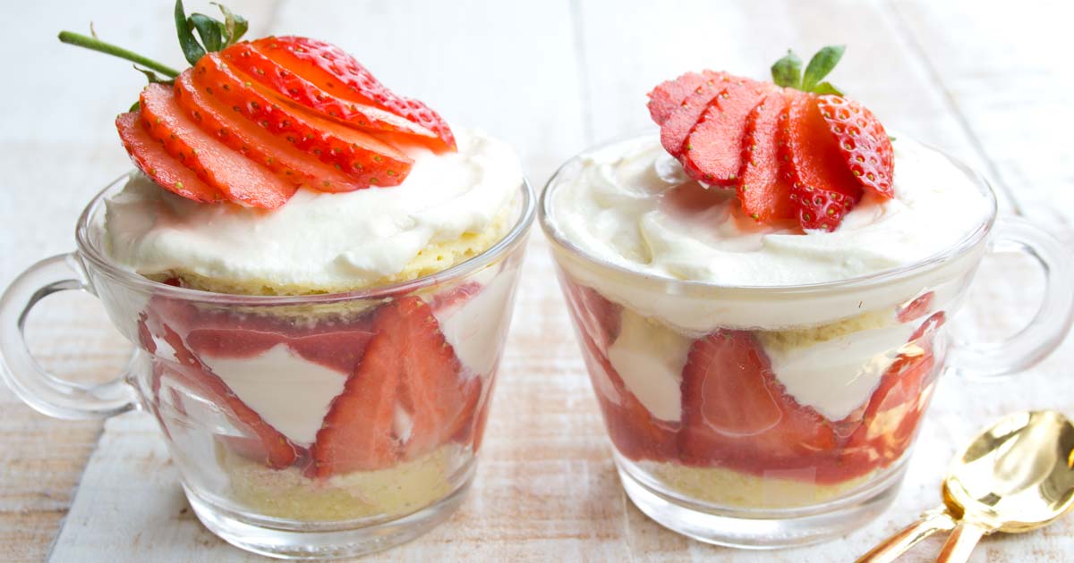 two glasses with strawberry shortcake trifle