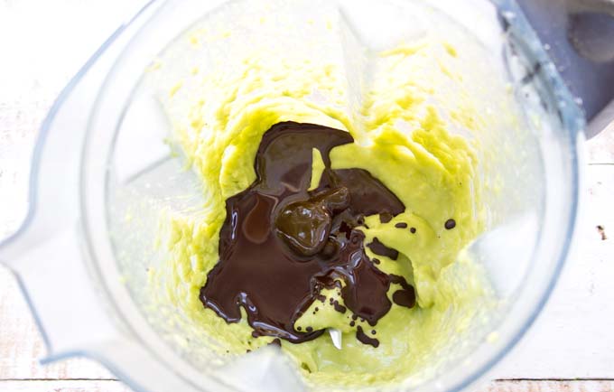blended avocado and melted chocolate in a blender jug