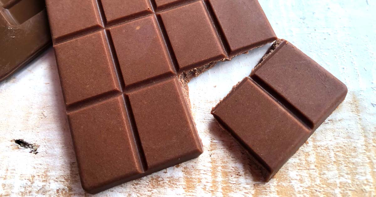 2 chocolate squares broken off a bar of milk chocolate