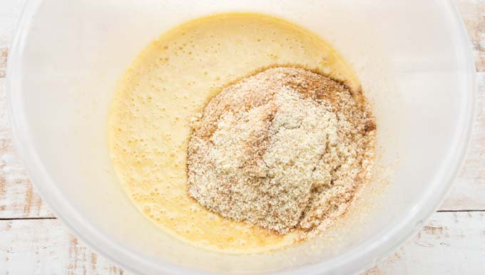 mixed wet ingredients for banana bread plus mixed dry ingredients in a bowl