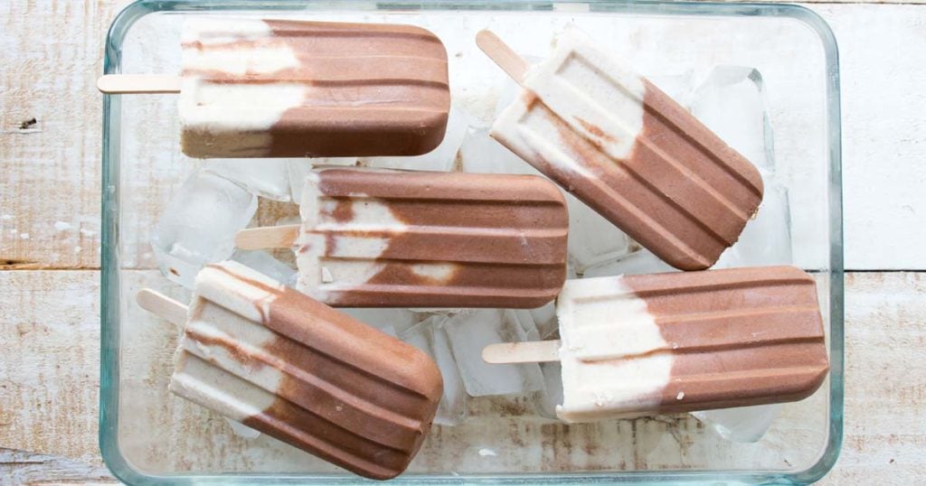 popsicles in a glass bowl on ice