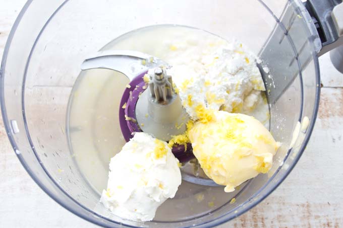 butter, cream cheese, lemon juice and sweetener in a food processor