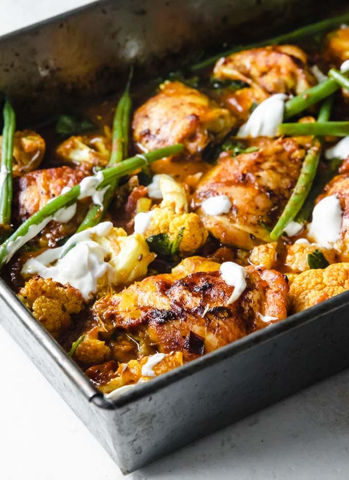 a chicken curry traybake with green beans