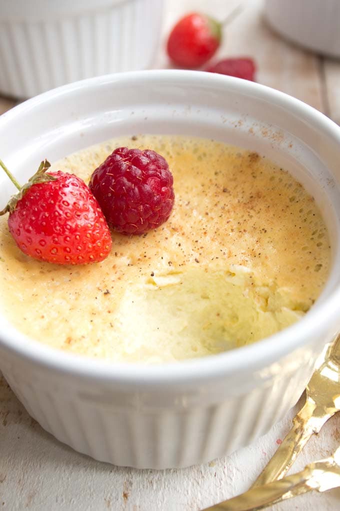 You only need 4 ingredients to make this incredibly creamy and delicious keto custard! The recipe uses coconut cream, which makes this custard much lighter than the classic version with dairy cream. As ever, a perfectly sugar free dessert! A custard with a bite missing so the texture of the inside is visible
