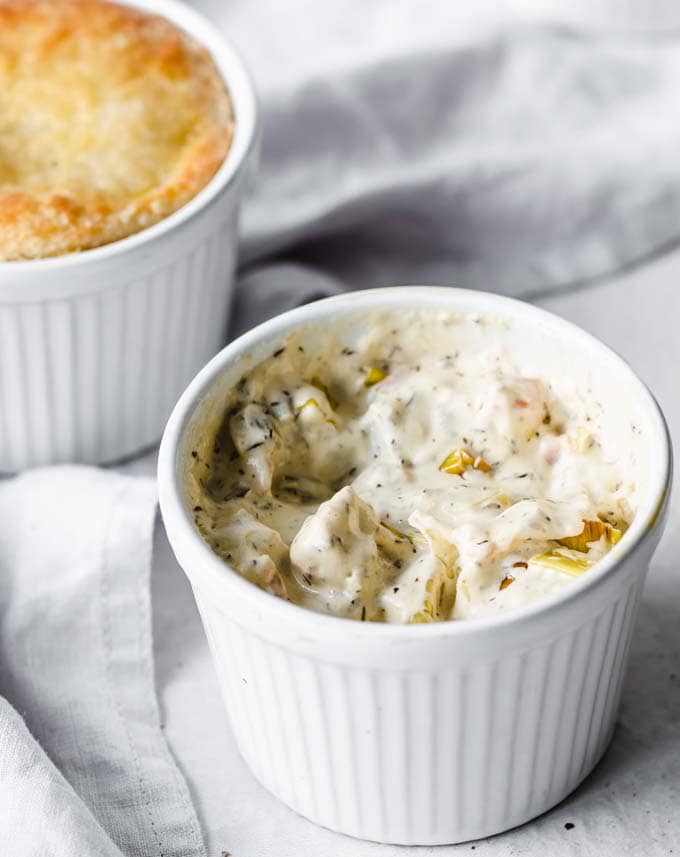 A mini pot pie in a ramekin without the crust