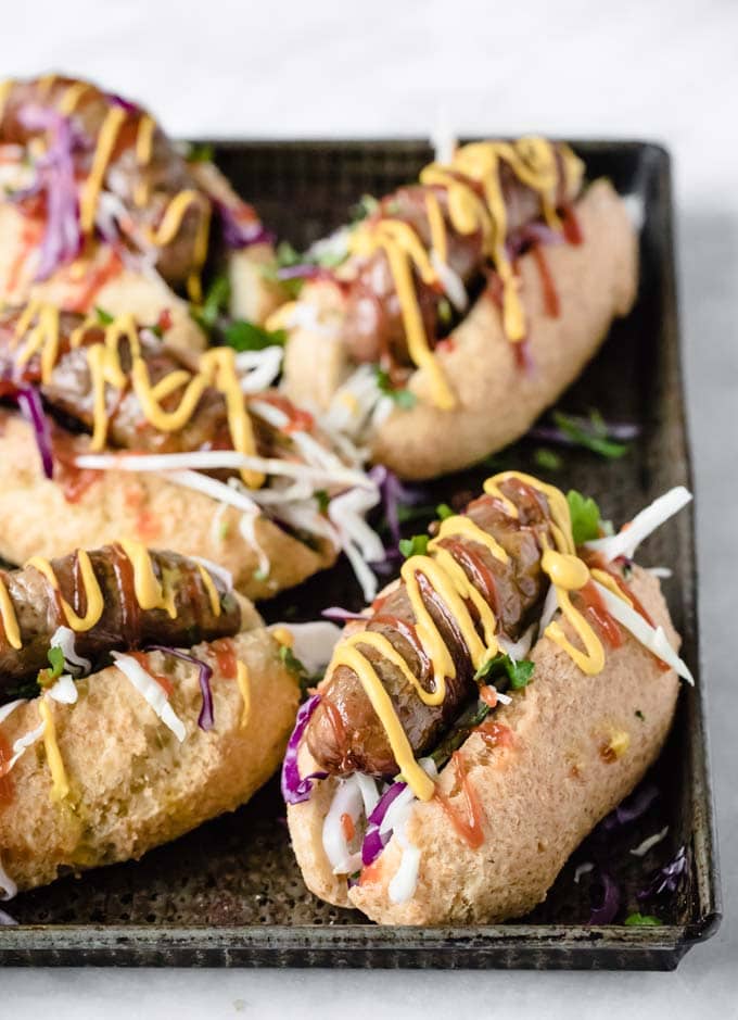 keto hot dogs with sausages and topped with mustard and ketchup