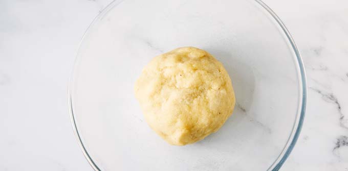 ball of fathead dough in a glass bowl
