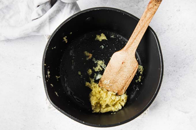 ginger in a frying pan with a spatula