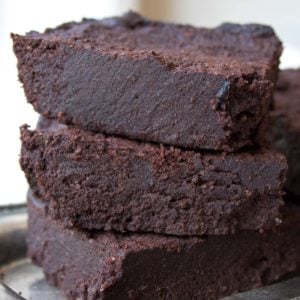 a stack of three keto brownies