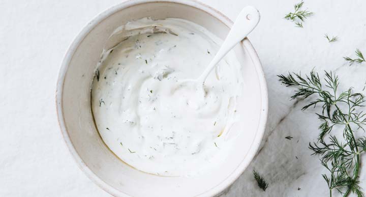 yoghurt dressing with dill in a bowl