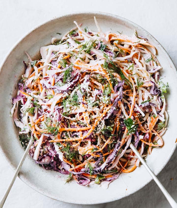 a plate with colourful coleslaw with yoghurt dressing