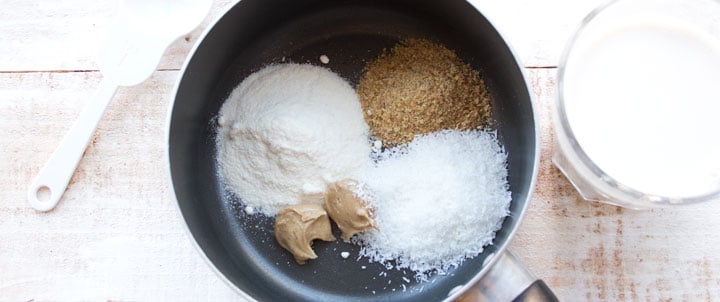 coconut flour, flaxmeal, sweetener and nut butter in a saucepan and a glass of milk