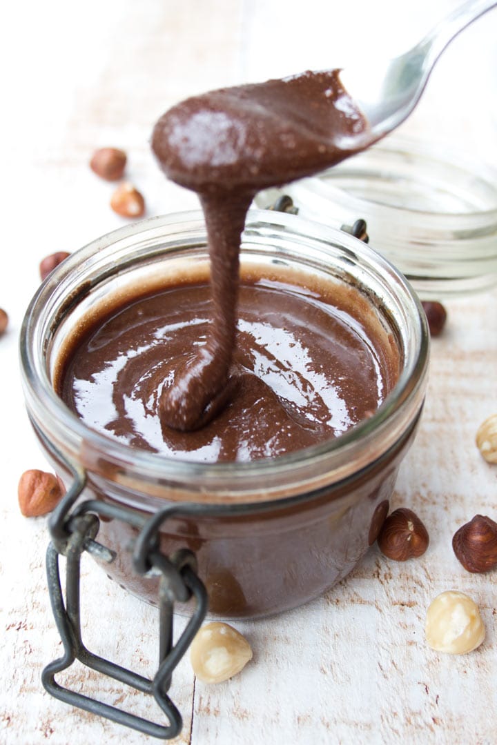 hazelnut spread dripping off a spoon