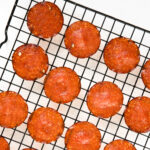 crispy pepperoni chips on a wire rack