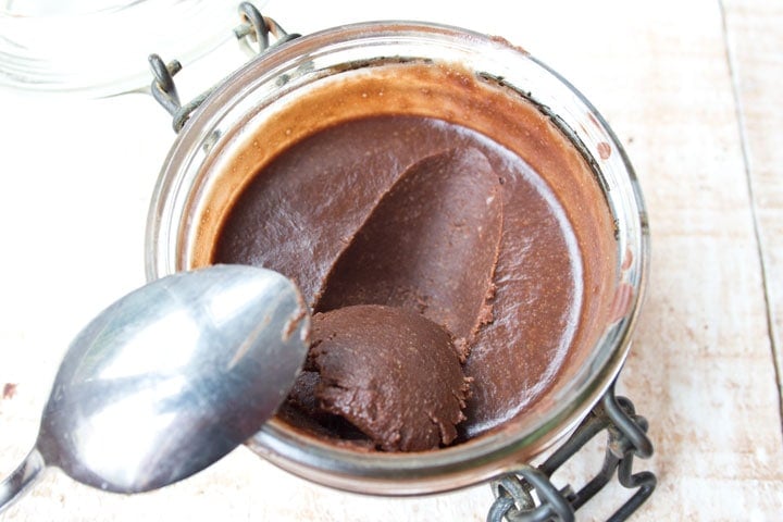 sugar free nutella straight from the fridge showing its firmness by taking a spoonful