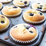 keto blueberry muffins in a muffin pan