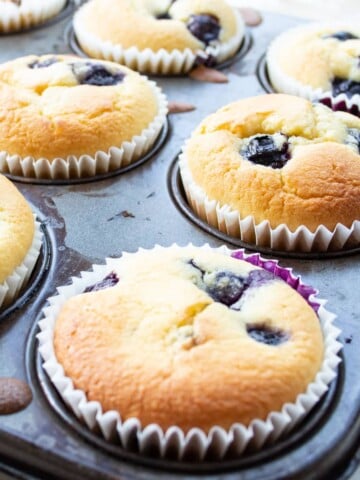 keto blueberry muffins in a muffin pan