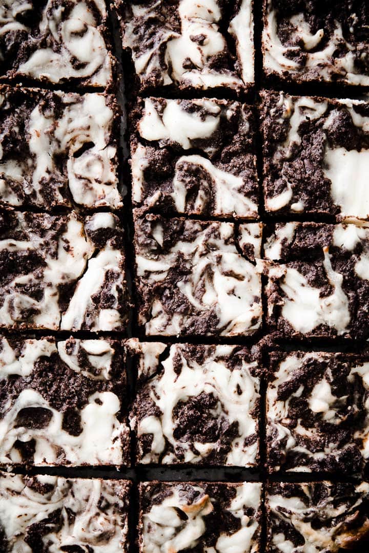squares of keto cheesecake brownies