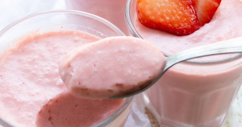a spoon full of keto strawberry mousse