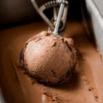 keto chocolate ice cream scooped out with an ice cream scooper