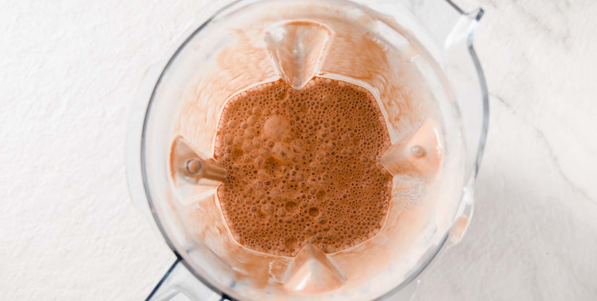 chocolate milkshake in a food processor bowl