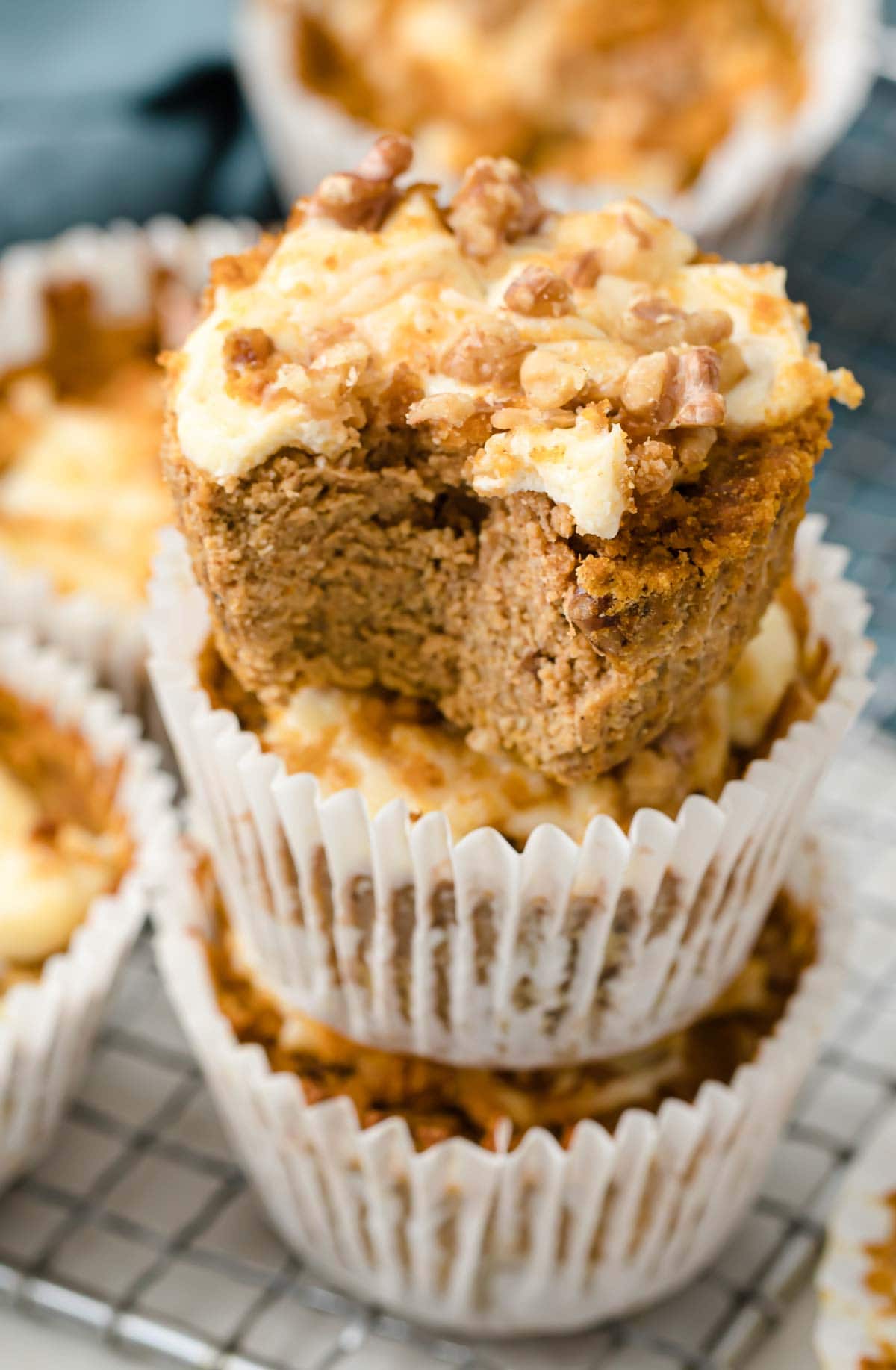 A stack of pumpkin cheesecake muffins. 