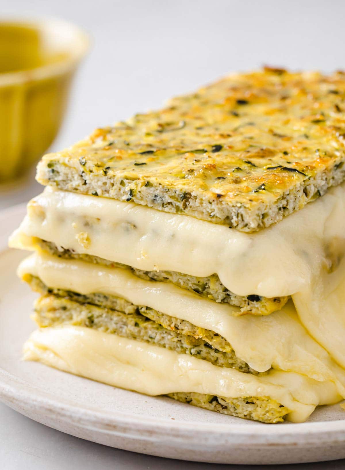 a stack of zucchini grilled cheese sandwiches