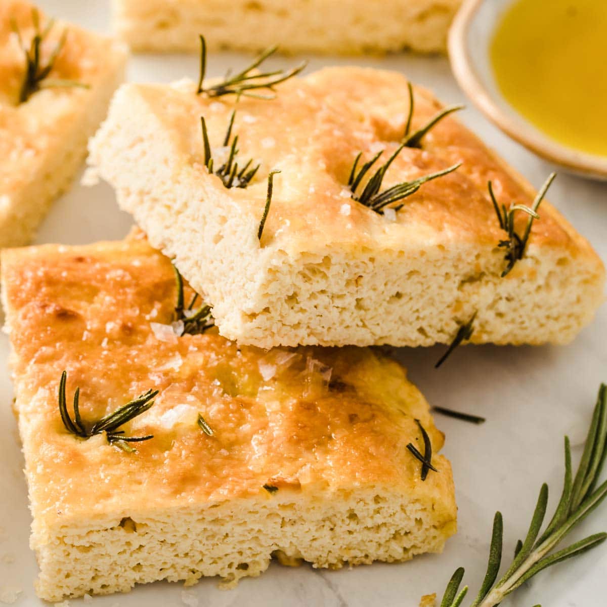 two slices of keto focaccia showing the fluffy inside