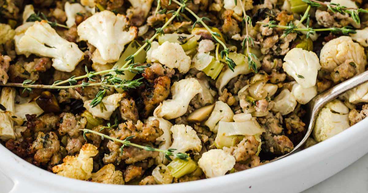 low carb stuffing with sausage, cauliflower and topped with fresh herbs