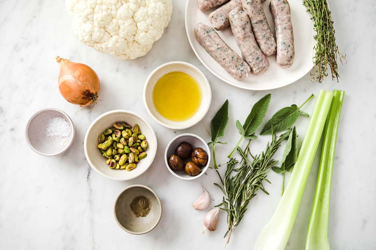 sausages, cauliflower and all other ingredients in bowls