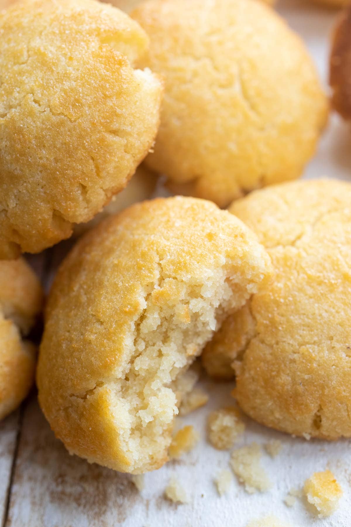 a bitten cookie showing the soft and crumbly inside