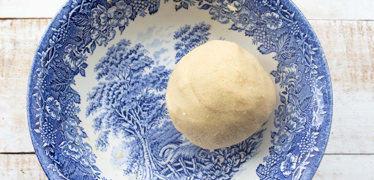 a ball of dough in a bowl