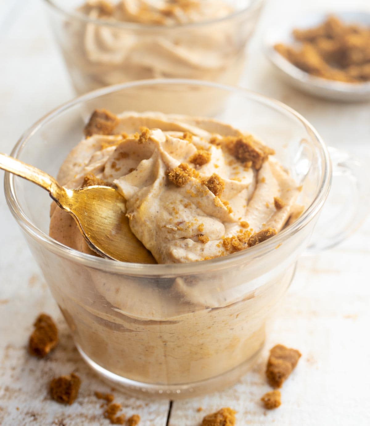 taking a spoonful of pumpkin mousse