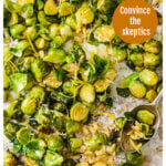 roasted brussels sprouts with parmesan and lemon on a baking tray