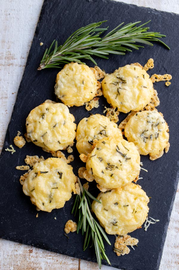 cheese and rosemary biscuits on a slate board