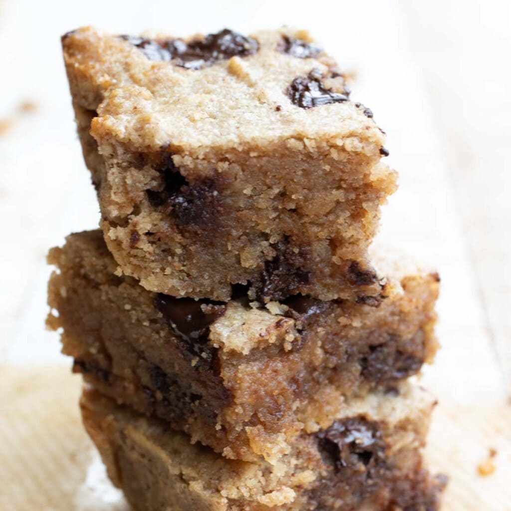 a stack of keto blondies with chocolate chips