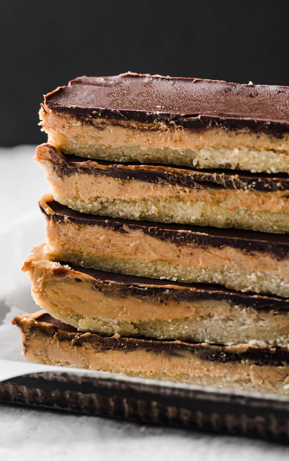 a stack of keto peanut butter bars