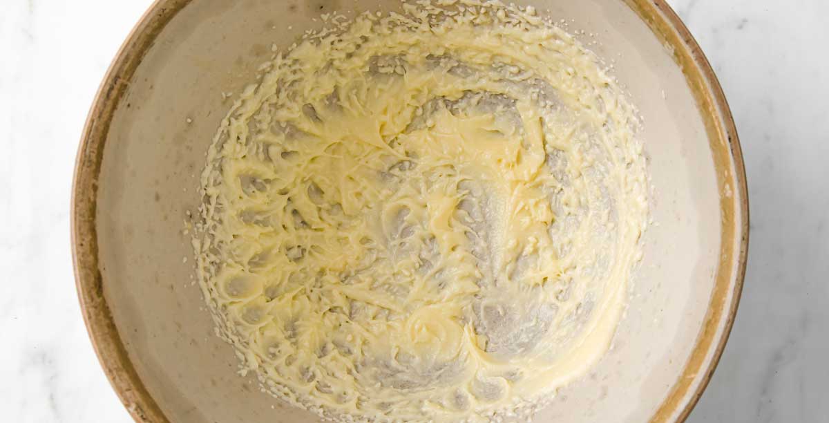 mixing butter and sweetener in a bowl