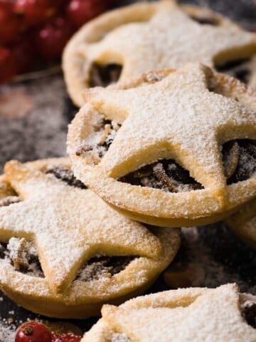 stacked keto mince pies dusted with powdered sweetener