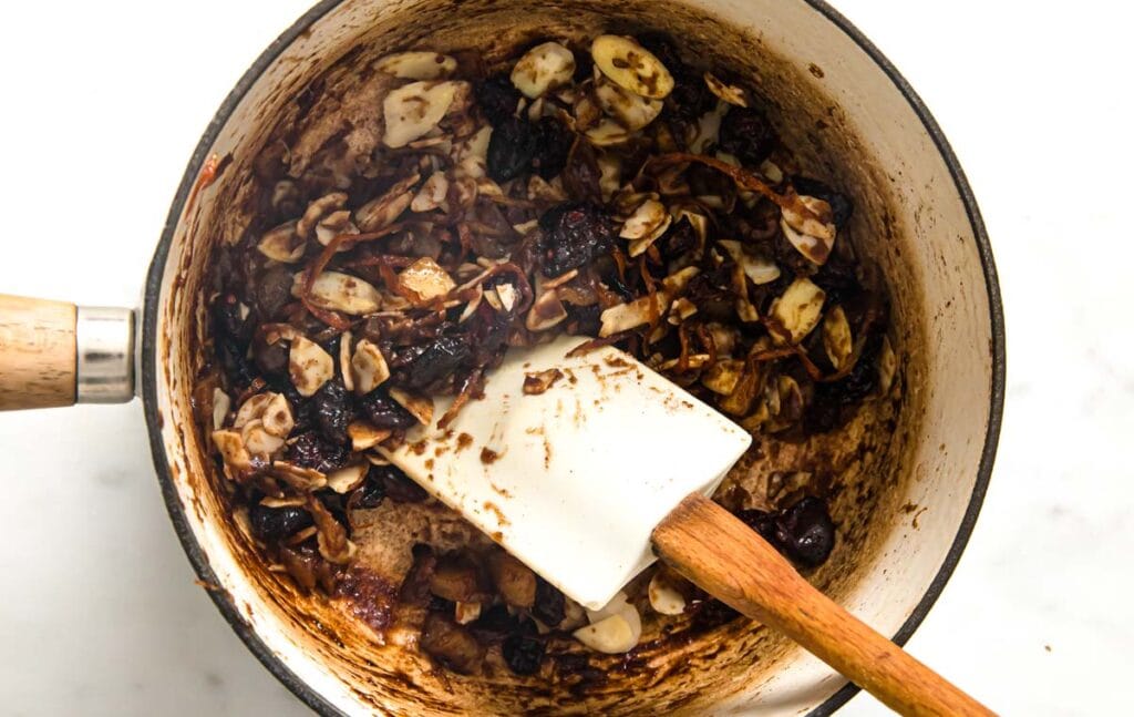 stirring mincemeat in a saucepan