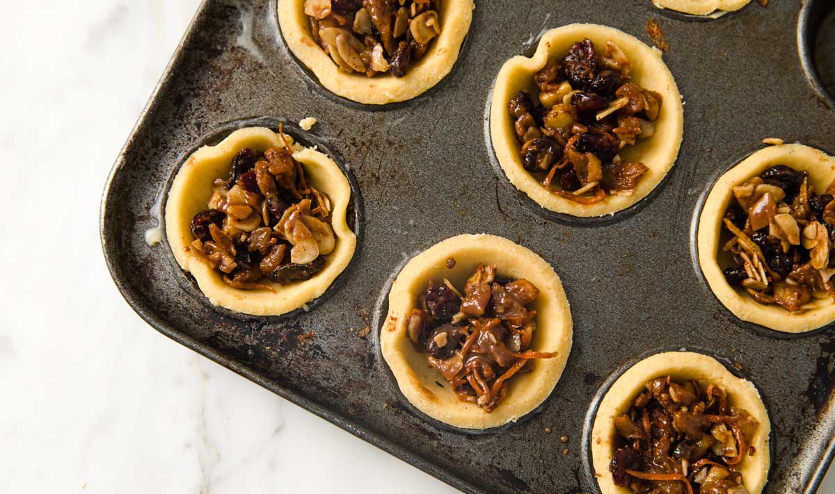 mince pies without the top before baking, leaving the filling visible,