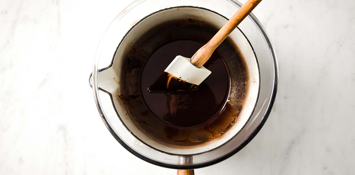 melting chocolate in a water bath with a spatula for stirring