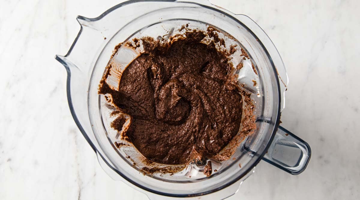 chocolate cake batter in a blender