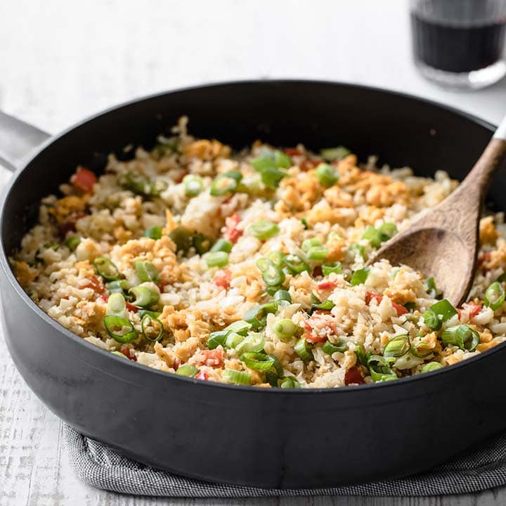 a pan with cauliflower fried rice