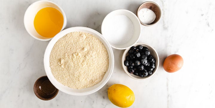 ingredients for blueberry scones measured out into bowls